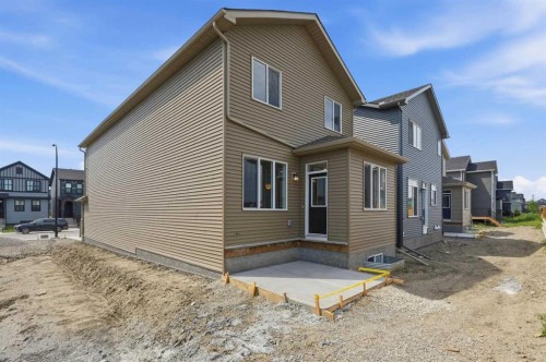 695 Buffaloberry Manor Se, Calgary, AB - Outdoor