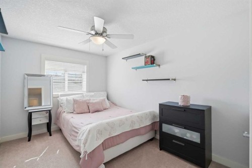 100 Cove Rise, Chestermere, AB - Indoor Photo Showing Bedroom