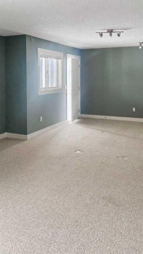 100 Cove Rise, Chestermere, AB - Indoor Photo Showing Other Room