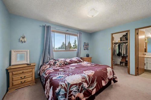 677 Wallace Drive, Carstairs, AB - Indoor Photo Showing Bedroom