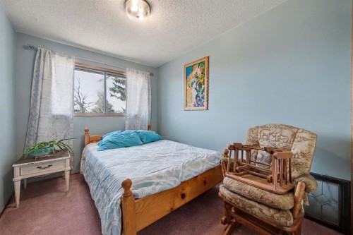 677 Wallace Drive, Carstairs, AB - Indoor Photo Showing Bedroom