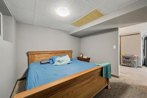 677 Wallace Drive, Carstairs, AB - Indoor Photo Showing Bedroom