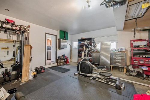 677 Wallace Drive, Carstairs, AB - Indoor Photo Showing Gym Room