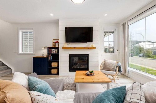 4629 72 Street Nw, Calgary, AB - Indoor Photo Showing Living Room With Fireplace