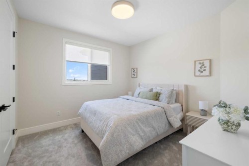 14 Opal Place, Balzac, AB - Indoor Photo Showing Bedroom