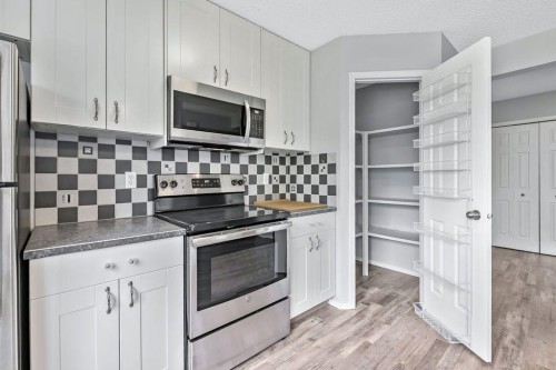 24 Cimarron Meadows Road, Okotoks, AB 
