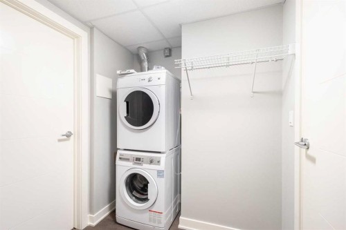 1004-930 6 Avenue Sw, Calgary, AB - Indoor Photo Showing Laundry Room