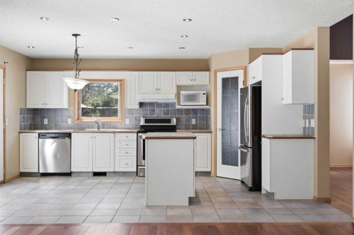144 Douglas Ridge Close Se, Calgary, AB - Indoor Photo Showing Kitchen With Stainless Steel Kitchen