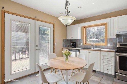 144 Douglas Ridge Close Se, Calgary, AB - Indoor Photo Showing Dining Room
