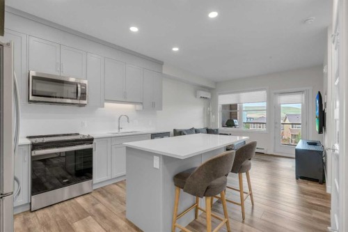 315-55 Wolf Hollow Crescent Se, Calgary, AB - Indoor Photo Showing Kitchen With Stainless Steel Kitchen With Upgraded Kitchen
