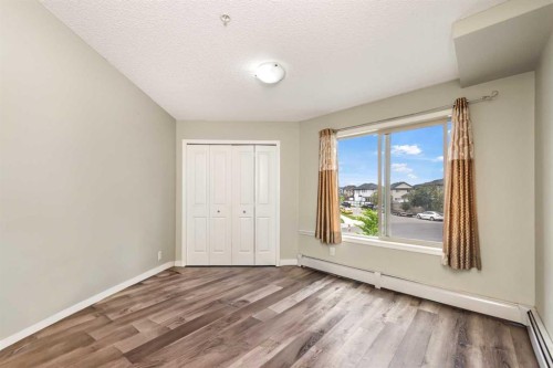 207-5 Saddlestone Way Ne, Calgary, AB - Indoor Photo Showing Other Room