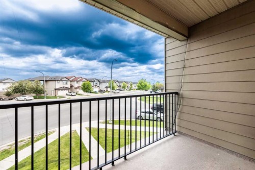 207-5 Saddlestone Way Ne, Calgary, AB - Outdoor With Balcony With Exterior