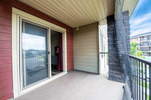 207-5 Saddlestone Way Ne, Calgary, AB - Outdoor With Balcony With Exterior