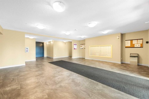 207-5 Saddlestone Way Ne, Calgary, AB - Indoor Photo Showing Other Room