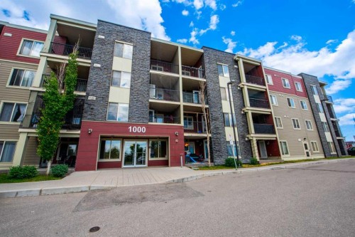 207-5 Saddlestone Way Ne, Calgary, AB - Outdoor With Balcony With Facade
