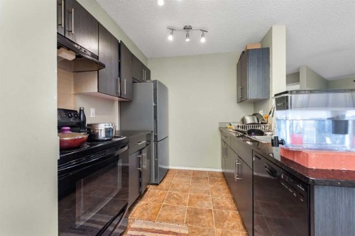 207-5 Saddlestone Way Ne, Calgary, AB - Indoor Photo Showing Kitchen