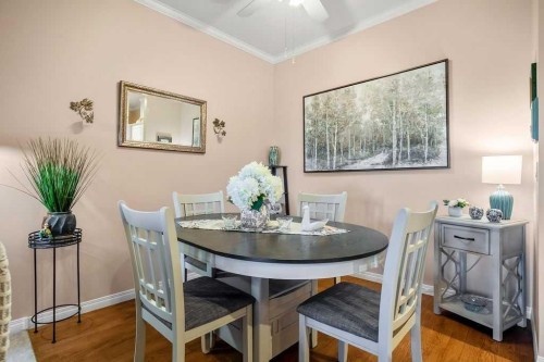 302-15 Lineham Avenue, Okotoks, AB - Indoor Photo Showing Dining Room