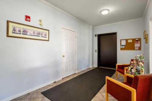 302-15 Lineham Avenue, Okotoks, AB - Indoor Photo Showing Other Room