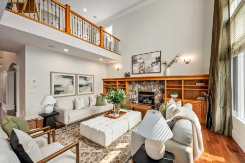 41 Aspen Ridge Way Sw, Calgary, AB - Indoor Photo Showing Living Room With Fireplace