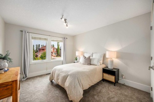 41 Aspen Ridge Way Sw, Calgary, AB - Indoor Photo Showing Bedroom