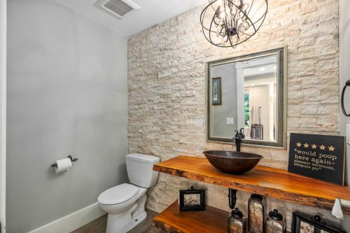 41 Aspen Ridge Way Sw, Calgary, AB - Indoor Photo Showing Bathroom With Fireplace