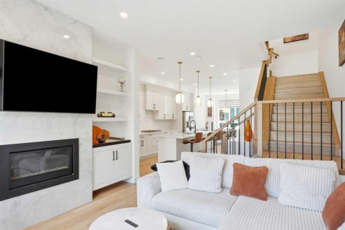 2808 40 Street Sw, Calgary, AB - Indoor Photo Showing Living Room With Fireplace