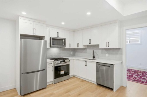 2808 40 Street Sw, Calgary, AB - Indoor Photo Showing Kitchen With Stainless Steel Kitchen With Upgraded Kitchen