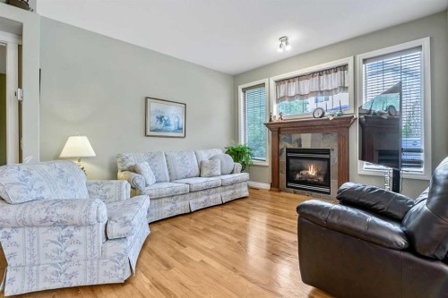 14 Cimarron Park Cove, Okotoks, AB 