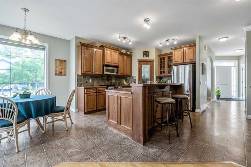 14 Cimarron Park Cove, Okotoks, AB 
