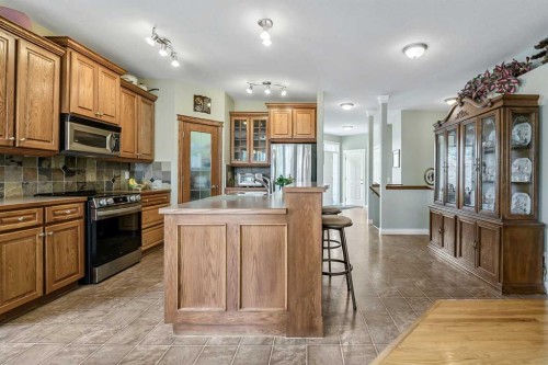 14 Cimarron Park Cove, Okotoks, AB 