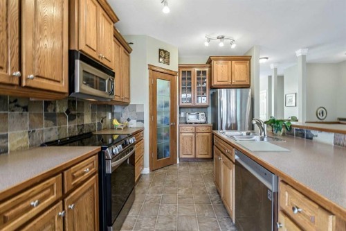 14 Cimarron Park Cove, Okotoks, AB 