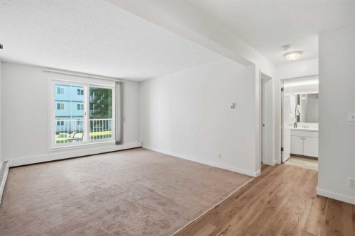 203B-5601 Dalton Drive Nw, Calgary, AB - Indoor Photo Showing Other Room