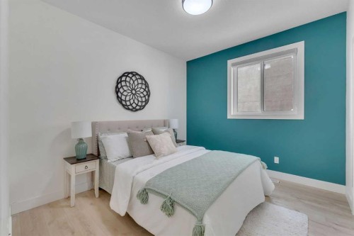 247 Coopers Cove Sw, Airdrie, AB - Indoor Photo Showing Bedroom