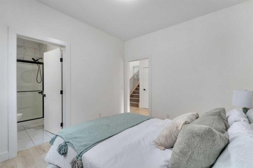 247 Coopers Cove Sw, Airdrie, AB - Indoor Photo Showing Bedroom