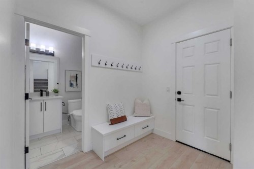 247 Coopers Cove Sw, Airdrie, AB - Indoor Photo Showing Other Room