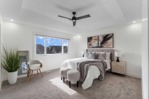 247 Coopers Cove Sw, Airdrie, AB - Indoor Photo Showing Bedroom