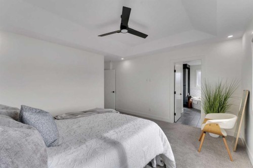 247 Coopers Cove Sw, Airdrie, AB - Indoor Photo Showing Bedroom