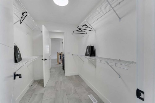 247 Coopers Cove Sw, Airdrie, AB - Indoor With Storage