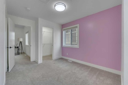 247 Coopers Cove Sw, Airdrie, AB - Indoor Photo Showing Other Room