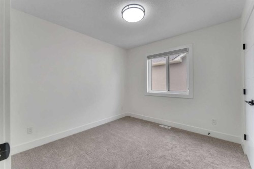 247 Coopers Cove Sw, Airdrie, AB - Indoor Photo Showing Other Room