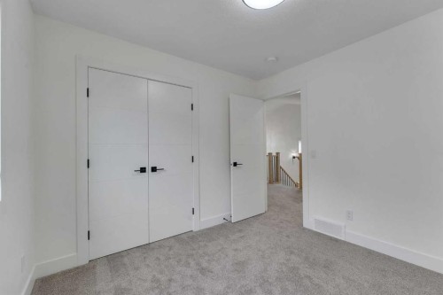 247 Coopers Cove Sw, Airdrie, AB - Indoor Photo Showing Other Room