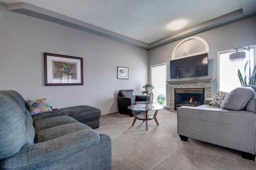 2391 Morris Crescent Se, Airdrie, AB - Indoor Photo Showing Living Room With Fireplace