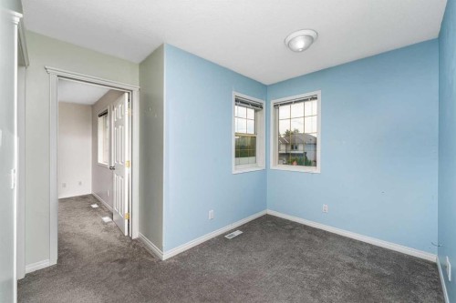 1-12 Silver Creek Boulevard Nw, Airdrie, AB - Indoor Photo Showing Other Room