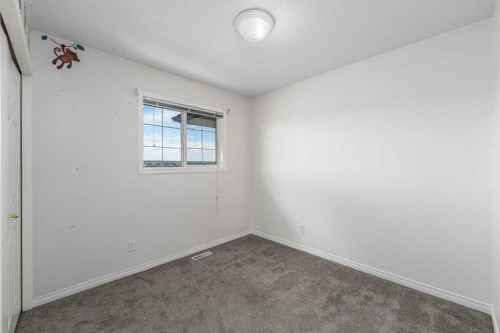 1-12 Silver Creek Boulevard Nw, Airdrie, AB - Indoor Photo Showing Other Room