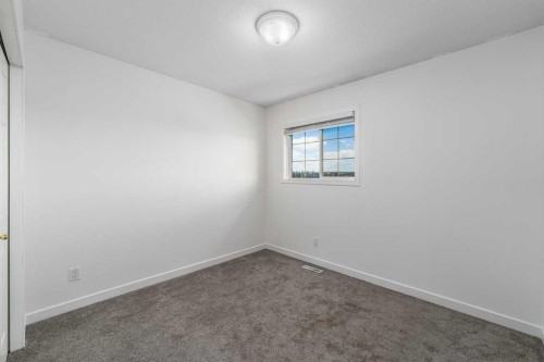 1-12 Silver Creek Boulevard Nw, Airdrie, AB - Indoor Photo Showing Other Room