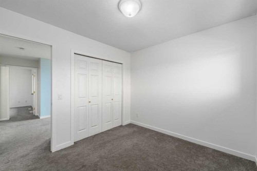 1-12 Silver Creek Boulevard Nw, Airdrie, AB - Indoor Photo Showing Other Room