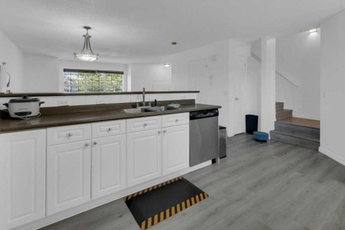 109 Tuscany Springs Gardens Nw, Calgary, AB - Indoor Photo Showing Kitchen With Double Sink