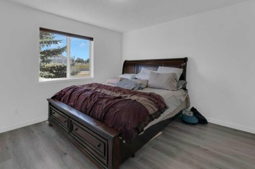 109 Tuscany Springs Gardens Nw, Calgary, AB - Indoor Photo Showing Bedroom