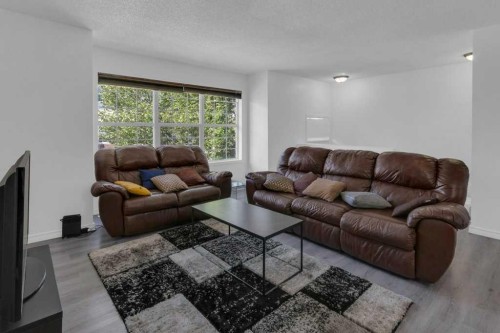 109 Tuscany Springs Gardens Nw, Calgary, AB - Indoor Photo Showing Living Room