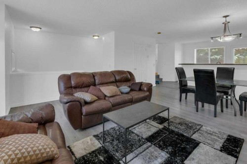 109 Tuscany Springs Gardens Nw, Calgary, AB - Indoor Photo Showing Living Room